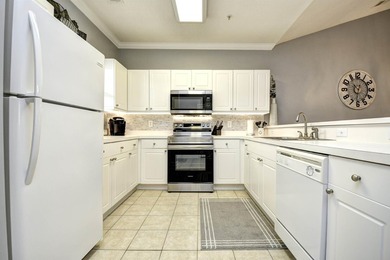 This beautiful, fully furnished top-floor 2-bedroom Willow Bend on Barefoot Resort and Golf Club  in South Carolina - for sale on GolfHomes.com, golf home, golf lot