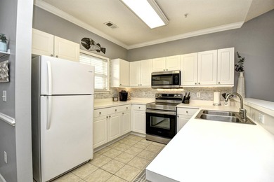 This beautiful, fully furnished top-floor 2-bedroom Willow Bend on Barefoot Resort and Golf Club  in South Carolina - for sale on GolfHomes.com, golf home, golf lot