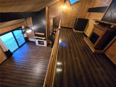 This beautifully updated 1-bedroom, 1-bath Quadna Mountain on Quadna Mountain Resort Golf Course in Minnesota - for sale on GolfHomes.com, golf home, golf lot