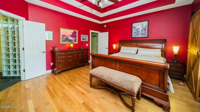 Stunning Golf Course Custom Home in Brunswick Plantation - on Brunswick Plantation and Golf Resorts in North Carolina - for sale on GolfHomes.com, golf home, golf lot