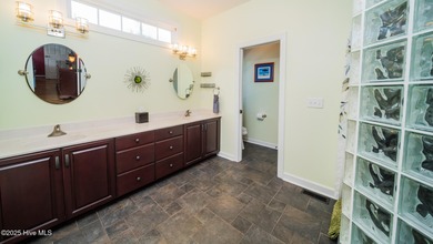 Stunning Golf Course Custom Home in Brunswick Plantation - on Brunswick Plantation and Golf Resorts in North Carolina - for sale on GolfHomes.com, golf home, golf lot