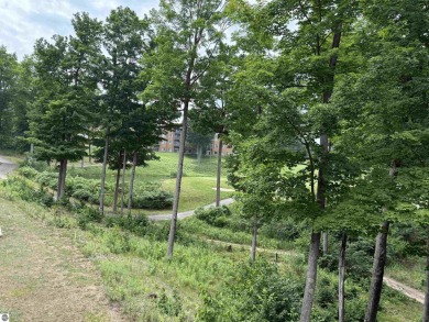 Ski-In/Ski-Out Shanty Creek Condo Overlooking the 18th Green - on Cedar River Golf Course in Michigan - for sale on GolfHomes.com, golf home, golf lot
