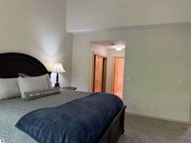 Ski-In/Ski-Out Shanty Creek Condo Overlooking the 18th Green - on Cedar River Golf Course in Michigan - for sale on GolfHomes.com, golf home, golf lot
