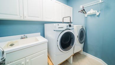 Stunning Golf Course Custom Home in Brunswick Plantation - on Brunswick Plantation and Golf Resorts in North Carolina - for sale on GolfHomes.com, golf home, golf lot