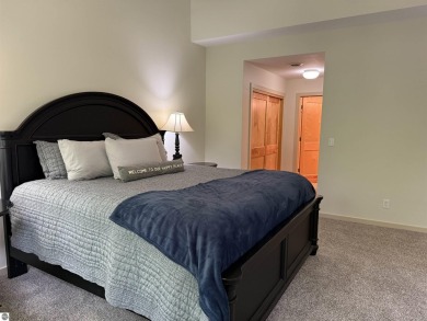 Ski-In/Ski-Out Shanty Creek Condo Overlooking the 18th Green - on Cedar River Golf Course in Michigan - for sale on GolfHomes.com, golf home, golf lot