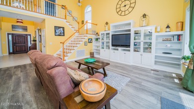 Stunning Golf Course Custom Home in Brunswick Plantation - on Brunswick Plantation and Golf Resorts in North Carolina - for sale on GolfHomes.com, golf home, golf lot