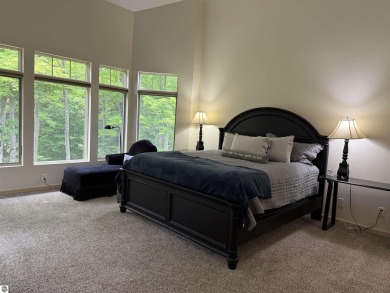 Ski-In/Ski-Out Shanty Creek Condo Overlooking the 18th Green - on Cedar River Golf Course in Michigan - for sale on GolfHomes.com, golf home, golf lot