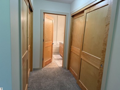 Ski-In/Ski-Out Shanty Creek Condo Overlooking the 18th Green - on Cedar River Golf Course in Michigan - for sale on GolfHomes.com, golf home, golf lot
