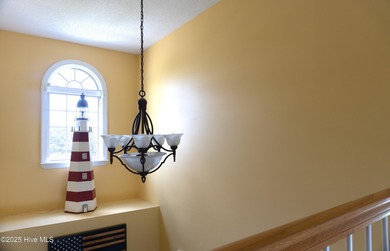 Stunning Golf Course Custom Home in Brunswick Plantation - on Brunswick Plantation and Golf Resorts in North Carolina - for sale on GolfHomes.com, golf home, golf lot