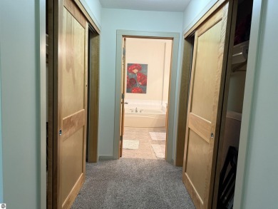 Ski-In/Ski-Out Shanty Creek Condo Overlooking the 18th Green - on Cedar River Golf Course in Michigan - for sale on GolfHomes.com, golf home, golf lot
