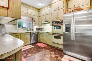 Upstairs has 640 sq feet which is not included in the total sq on Kinston Country Club Inc in North Carolina - for sale on GolfHomes.com, golf home, golf lot