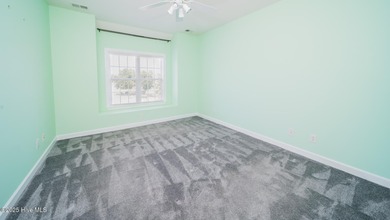 Stunning Golf Course Custom Home in Brunswick Plantation - on Brunswick Plantation and Golf Resorts in North Carolina - for sale on GolfHomes.com, golf home, golf lot