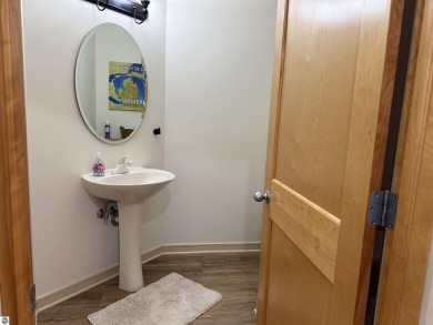 Ski-In/Ski-Out Shanty Creek Condo Overlooking the 18th Green - on Cedar River Golf Course in Michigan - for sale on GolfHomes.com, golf home, golf lot