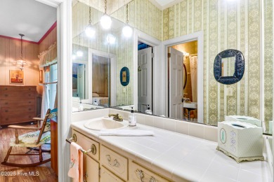 Upstairs has 640 sq feet which is not included in the total sq on Kinston Country Club Inc in North Carolina - for sale on GolfHomes.com, golf home, golf lot