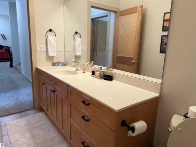 Ski-In/Ski-Out Shanty Creek Condo Overlooking the 18th Green - on Cedar River Golf Course in Michigan - for sale on GolfHomes.com, golf home, golf lot