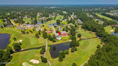 Stunning Golf Course Custom Home in Brunswick Plantation - on Brunswick Plantation and Golf Resorts in North Carolina - for sale on GolfHomes.com, golf home, golf lot