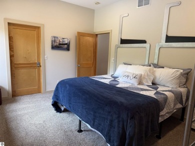 Ski-In/Ski-Out Shanty Creek Condo Overlooking the 18th Green - on Cedar River Golf Course in Michigan - for sale on GolfHomes.com, golf home, golf lot