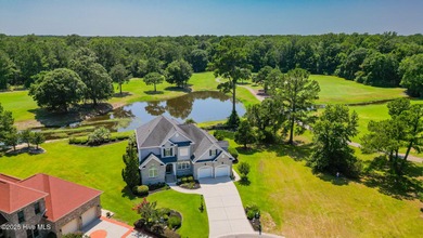 Stunning Golf Course Custom Home in Brunswick Plantation - on Brunswick Plantation and Golf Resorts in North Carolina - for sale on GolfHomes.com, golf home, golf lot
