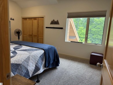 Ski-In/Ski-Out Shanty Creek Condo Overlooking the 18th Green - on Cedar River Golf Course in Michigan - for sale on GolfHomes.com, golf home, golf lot
