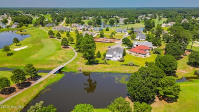 Stunning Golf Course Custom Home in Brunswick Plantation - on Brunswick Plantation and Golf Resorts in North Carolina - for sale on GolfHomes.com, golf home, golf lot