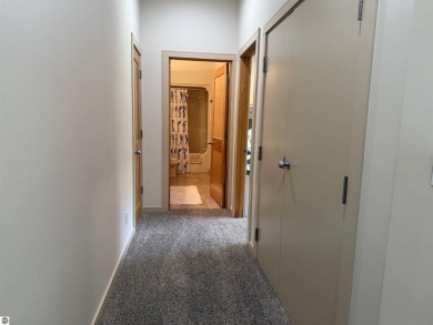 Ski-In/Ski-Out Shanty Creek Condo Overlooking the 18th Green - on Cedar River Golf Course in Michigan - for sale on GolfHomes.com, golf home, golf lot