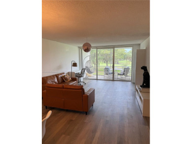 Welcome to this well-maintained 2-bedroom, 2-bathroom condo on Palm-Aire Country Club and Resort - The Oaks in Florida - for sale on GolfHomes.com, golf home, golf lot
