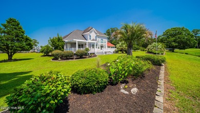 Stunning Golf Course Custom Home in Brunswick Plantation - on Brunswick Plantation and Golf Resorts in North Carolina - for sale on GolfHomes.com, golf home, golf lot