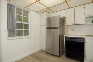 Welcome to this well-maintained 2-bedroom, 2-bathroom condo on Palm-Aire Country Club and Resort - The Oaks in Florida - for sale on GolfHomes.com, golf home, golf lot