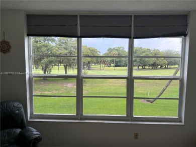 Welcome to this well-maintained 2-bedroom, 2-bathroom condo on Palm-Aire Country Club and Resort - The Oaks in Florida - for sale on GolfHomes.com, golf home, golf lot