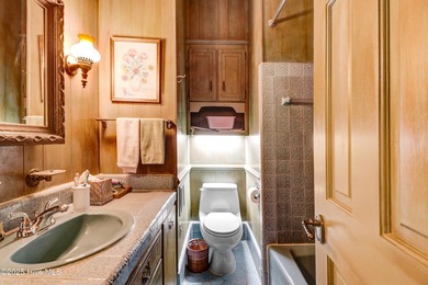 Upstairs has 640 sq feet which is not included in the total sq on Kinston Country Club Inc in North Carolina - for sale on GolfHomes.com, golf home, golf lot