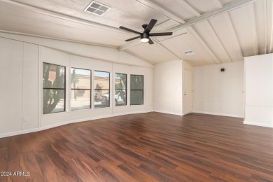 ON LEASED LAND-55+:This charming 2-bedroom, 1.75-bath home is on Sun City Riverview Golf Course in Arizona - for sale on GolfHomes.com, golf home, golf lot