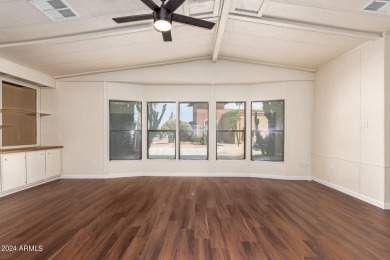 ON LEASED LAND-55+:This charming 2-bedroom, 1.75-bath home is on Sun City Riverview Golf Course in Arizona - for sale on GolfHomes.com, golf home, golf lot