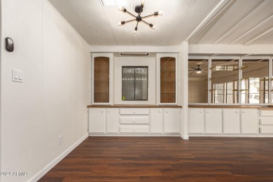 ON LEASED LAND-55+:This charming 2-bedroom, 1.75-bath home is on Sun City Riverview Golf Course in Arizona - for sale on GolfHomes.com, golf home, golf lot