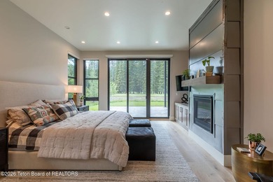 Nestled against the Bridger-Teton National Forest, 15415 Tall on Snake River Sporting Club in Wyoming - for sale on GolfHomes.com, golf home, golf lot