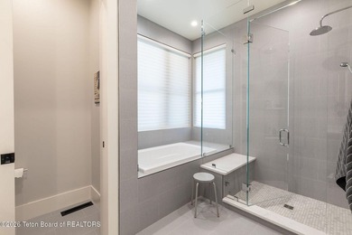 Nestled against the Bridger-Teton National Forest, 15415 Tall on Snake River Sporting Club in Wyoming - for sale on GolfHomes.com, golf home, golf lot