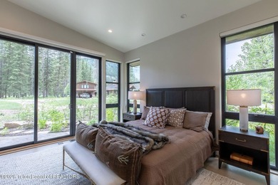 Nestled against the Bridger-Teton National Forest, 15415 Tall on Snake River Sporting Club in Wyoming - for sale on GolfHomes.com, golf home, golf lot