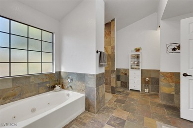 Move-in ready 4-bedroom, 3-bath home on a quiet cul-de-sac with on Los Prados Golf Course in Nevada - for sale on GolfHomes.com, golf home, golf lot