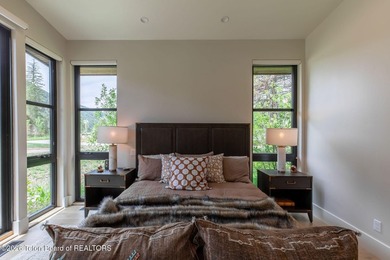 Nestled against the Bridger-Teton National Forest, 15415 Tall on Snake River Sporting Club in Wyoming - for sale on GolfHomes.com, golf home, golf lot