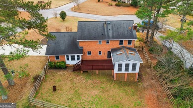 Welcome home to 560 Clubhouse Drive, ideally situated on a quiet on Honey Creek Country Club in Georgia - for sale on GolfHomes.com, golf home, golf lot