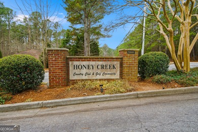 Welcome home to 560 Clubhouse Drive, ideally situated on a quiet on Honey Creek Country Club in Georgia - for sale on GolfHomes.com, golf home, golf lot