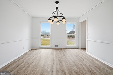 Welcome home to 560 Clubhouse Drive, ideally situated on a quiet on Honey Creek Country Club in Georgia - for sale on GolfHomes.com, golf home, golf lot