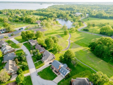 Immerse yourself in unparalleled luxury at this stunning estate on Meadow Lake Golf Course in Missouri - for sale on GolfHomes.com, golf home, golf lot