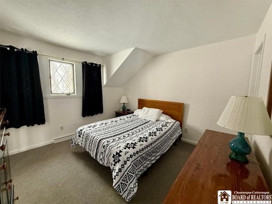 Located at the highly sought-after Peak 'n Peak Resort, this on Peek n Peak Golf Course - Upper  in New York - for sale on GolfHomes.com, golf home, golf lot