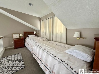 Located at the highly sought-after Peak 'n Peak Resort, this on Peek n Peak Golf Course - Upper  in New York - for sale on GolfHomes.com, golf home, golf lot