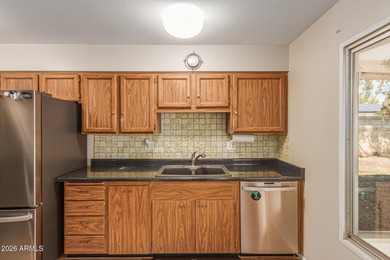 Effortless living in the heart of Sun City. This truly move-in on Union Hills Country Club in Arizona - for sale on GolfHomes.com, golf home, golf lot