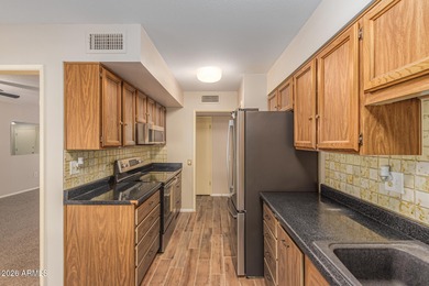 Effortless living in the heart of Sun City. This truly move-in on Union Hills Country Club in Arizona - for sale on GolfHomes.com, golf home, golf lot