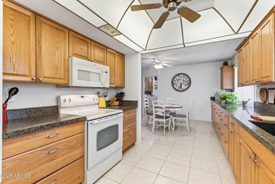 Don't miss this beautifully updated rare 3-bedroom, 2-bath on Sun City Lakes West and East in Arizona - for sale on GolfHomes.com, golf home, golf lot