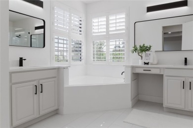 Welcome to this fully renovated, move-in ready masterpiece on Eagle Creek Golf Club in Florida - for sale on GolfHomes.com, golf home, golf lot