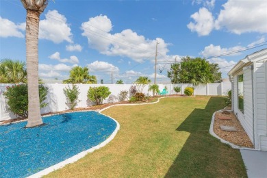 Step into this beautifully updated 3-bedroom, 2-bathroom home on North Lakes Golf Course in Florida - for sale on GolfHomes.com, golf home, golf lot