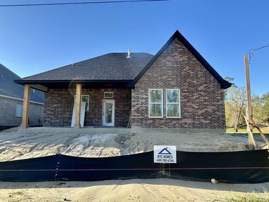 Discover luxury living in this brand-new RTC Home located on on Idylwild Golf Club in Texas - for sale on GolfHomes.com, golf home, golf lot